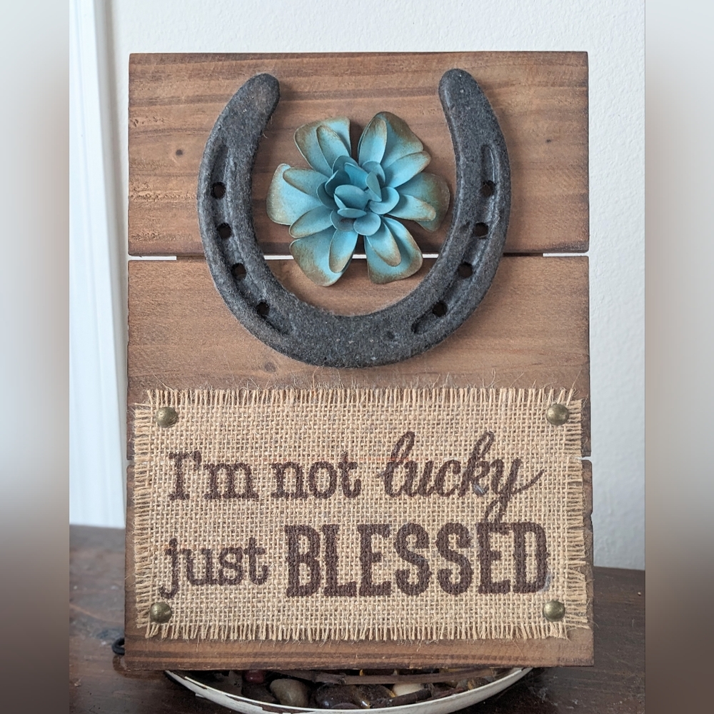 Wood wall plaque With horse shoe and metal flower. "I'm not Lucky. Just …